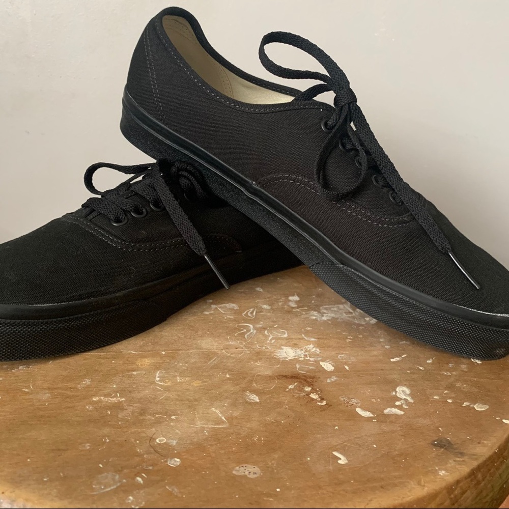 All black Vans sneakers